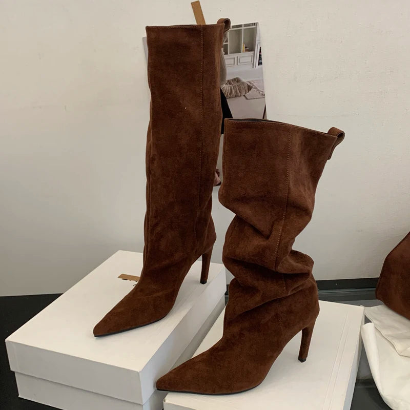 Pointed toe slouch knee boot