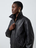 Model wearing the black Oversized Faux Leather Moto Jacket