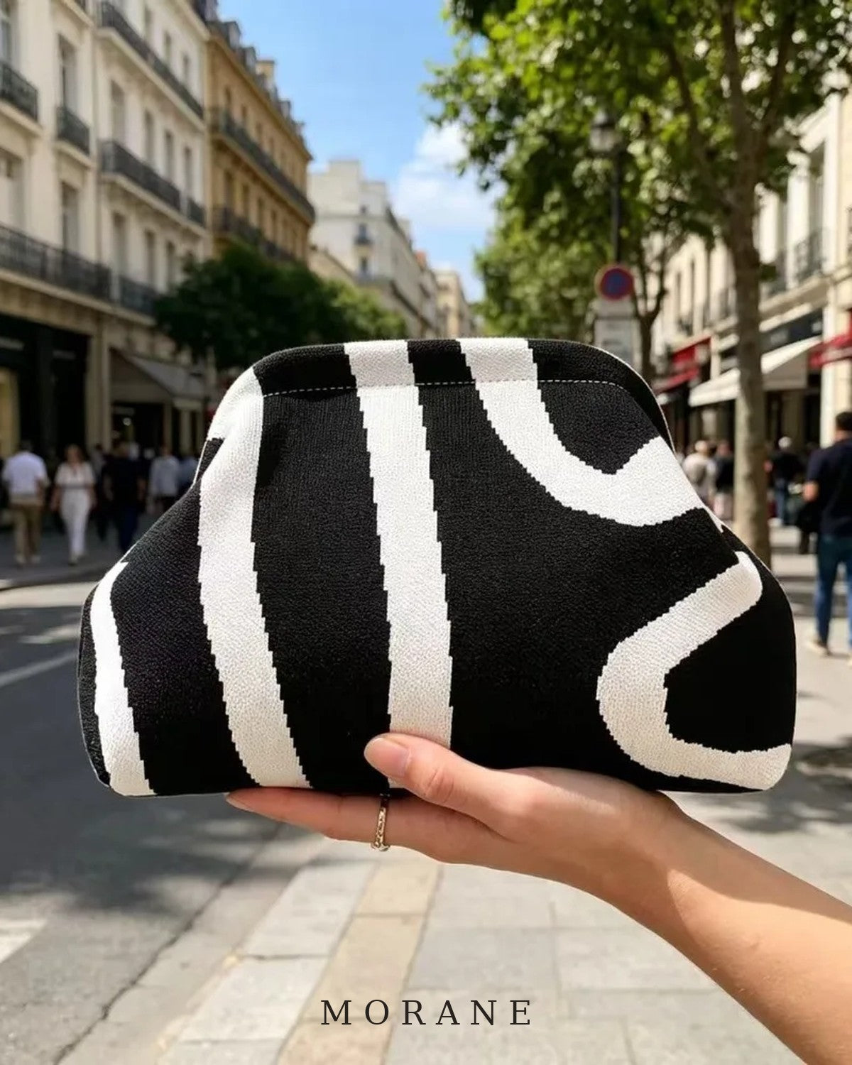 MORANE Graphic Stripe Knit Clutch